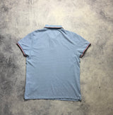 Moncler light blue polo shirt