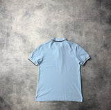 Prada light blue polo shirt black badge