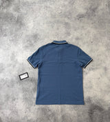 Prada blue polo shirt black badge