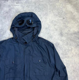 CP company navy blue micro M zip up goggle jacket