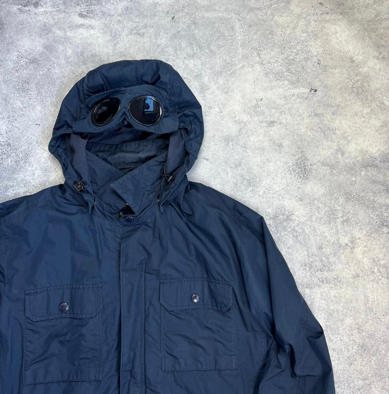 CP company navy blue micro M zip up goggle jacket